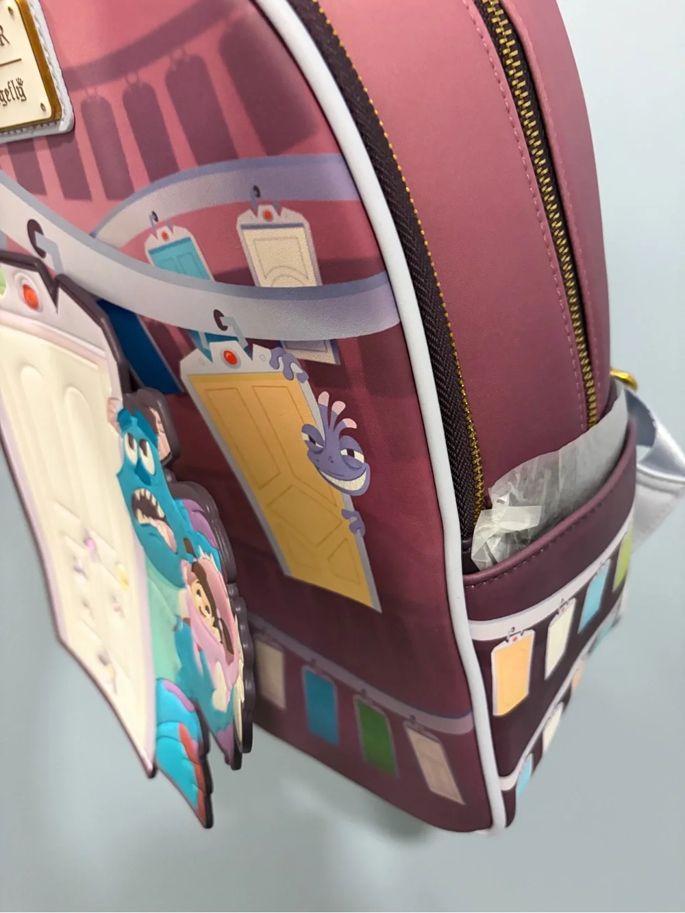 Loungefly Pixar Monsters, Inc. Pink & Teal Mini Backpack